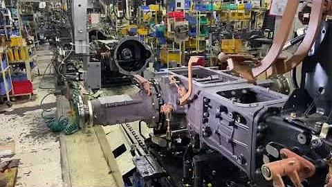 Vision guided robotics in tractor production line.