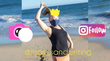 Creating Memories: Writing Names in the Sand at the Beach