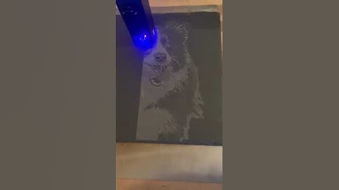 Slate engraving of a picture of a dog. Engraved by Atomstack A10 Pro.