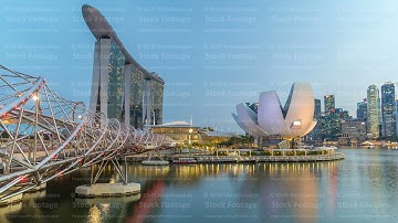 View of The Helix Bridge in Singapore day to night timelapse.