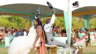 Kenyan Wedding: Beautiful couple play the Shoe Game on their day