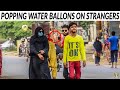 Smashing Water Balloons on Strangers Back Prank - Lahori PrankStar