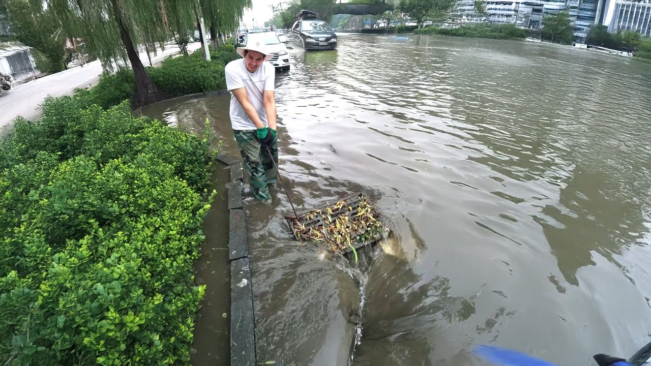 Unclogging Storm Drains A Key Solution to Roadway Flooding - YouTube