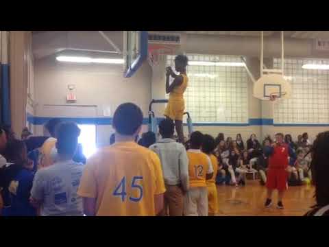 Raceland Middle School Boy's basketball team cuts net