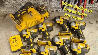Repairing a whole bucket of broken Dewalt tools.