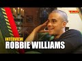 Capture de la vidéo Robbie Williams: 'What I Love The Most About Myself? My Massive $%!&*#@' | Interview | Tmf