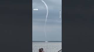 Storms caused a huge, mesmerising waterspout in South Carolina. #BBCNews