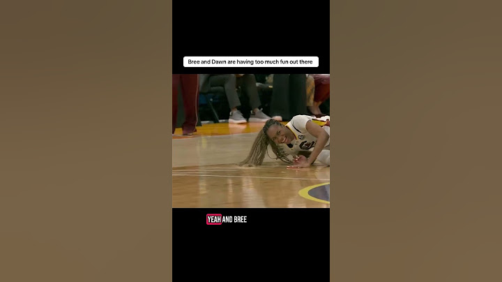 Bree Hall hits a three and then cracks up Coach Dawn Staley