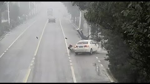 Electric Bicycle Crashes into Car in East China Village