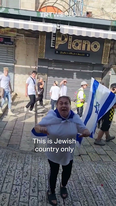 Israeli woman swears at Palestinians during so-called Israeli “flag march”