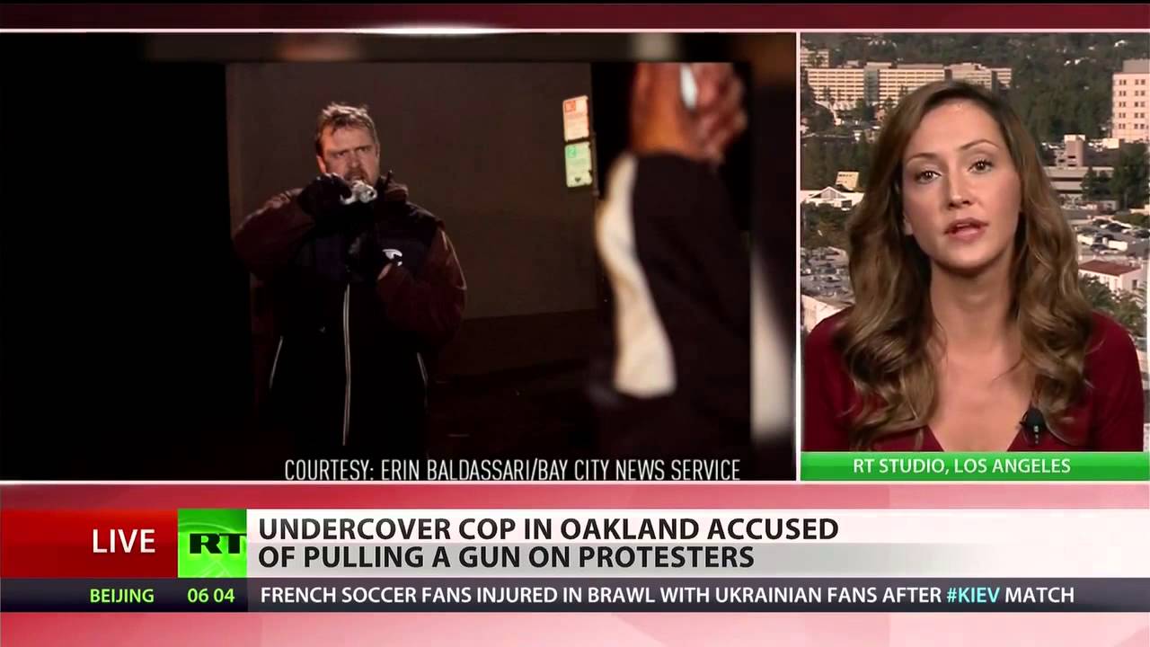 Undercover Cops Infiltrate Protest, Aim Gun At Marchers