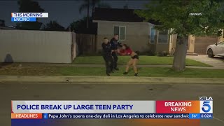 Video shows L.A. police restraining partygoers after reports of weapon at large gathering