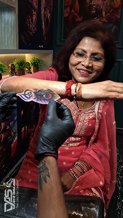  Om With Feather Tattoo #dastattoo #tattooideas #tattoodesigns # ...