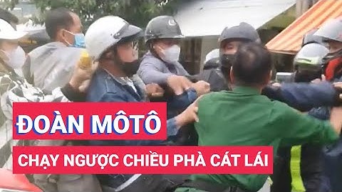 Đoàn mô tô chạy ngược chiều ở phà Cát Lái