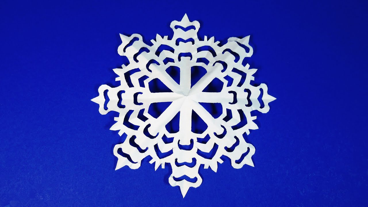 Примеры готовых бумажных снежинок, созданных по шаблону