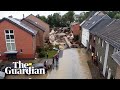 Drone footage shows giant sinkhole in German town after deadly floods