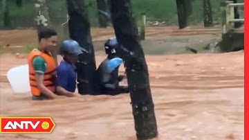 Công An Cứu Sống 2 Người Dân Bị Kẹt Giữa Dòng Nước Xiết Tại Bình Phước | Tin Tức 24h | ANTV