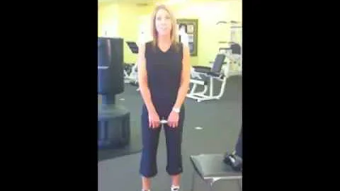 Certified Personal Trainer Theresa Gordon demonstr...