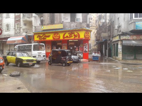 شارع إيزيس محرم بك الشتاء منهمر فشيك فشيك مش فشيك أوي    