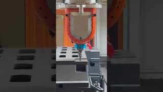 Using our own gantry machining center to produce critical components for the machines we build.