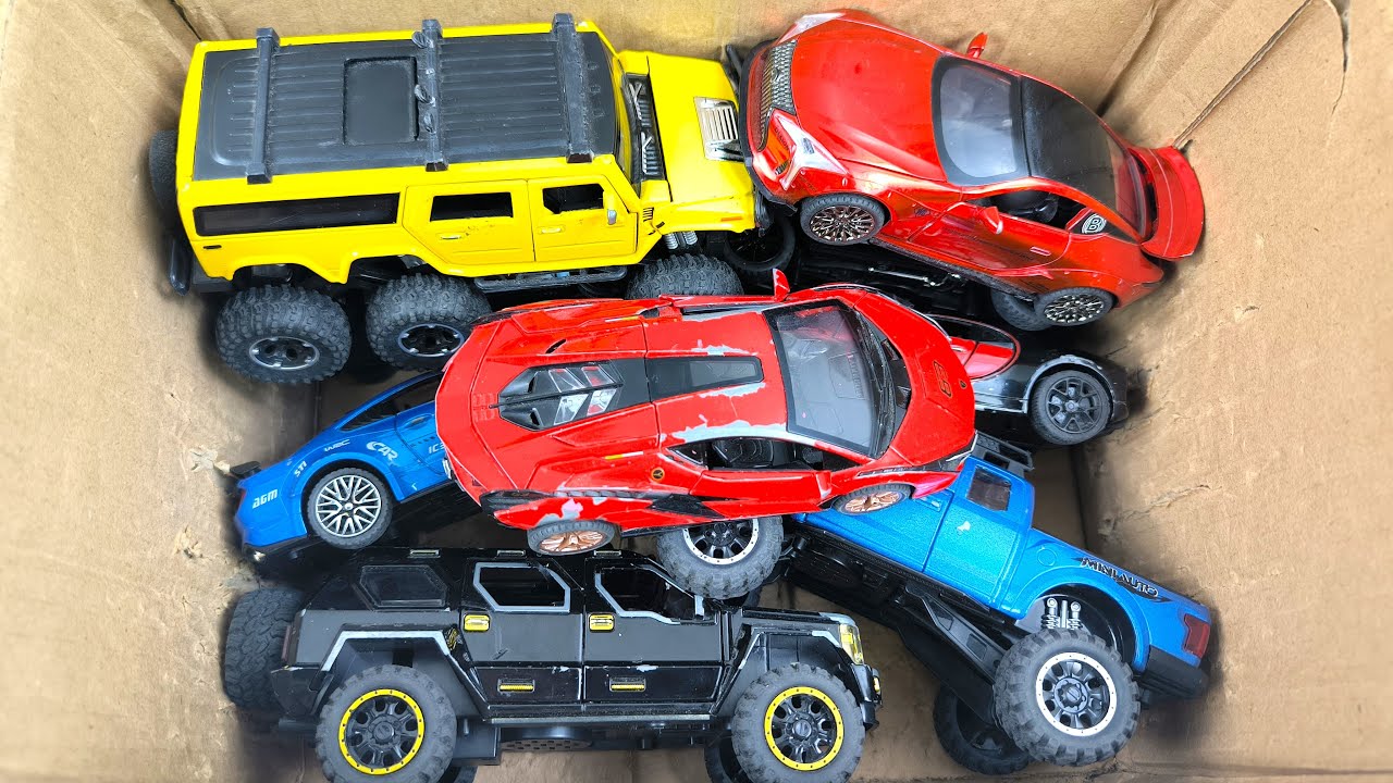 Box Full of Model Cars -Mazda Mx5, Koenigesgg Jesko, Lamborghini Scv12, Byd Yang Wang U8, Toyota Car