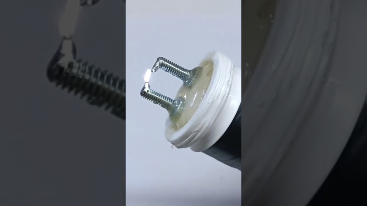 Making an electric spark lighter to light a fire.