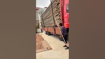 Unbelievable: One Man Unloads a Truckload of Bamboo Poles