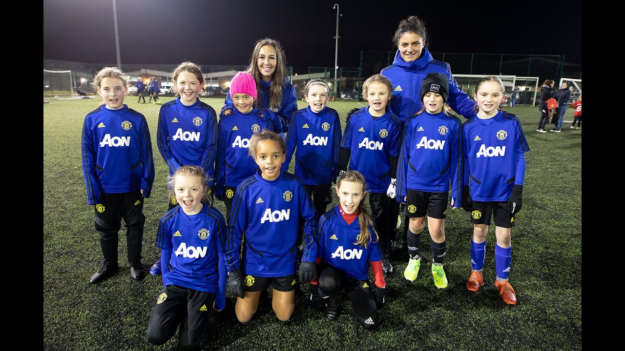 Katie Zelem and Jess Sigsworth visit female footballers at Manchester United's Regional Talent Club