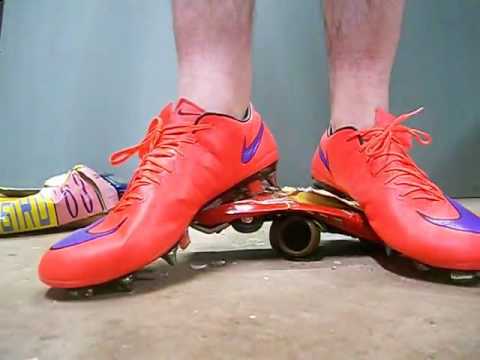 Vintage Tin Car crushed barefoot stomped with Nike Cleats