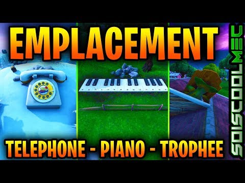 fortnite---visiter-un-Énorme-tÉlÉphone,-un-grand-piano-et-un-trophÉe-de-pÊche-gÉant