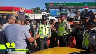 Taxistas colapsan acceso al aeropuerto de Guadalajara por presuntos abusos de la GN | Noticias GDL