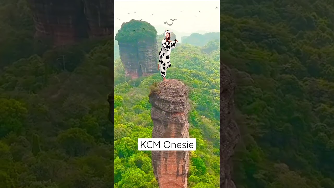 Howdy from the mountaintop! 🐄🏔️ Rocking my cow onesie like a boss 😎 