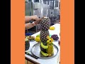 ÁRBOL DE PIÑA CON MONOS DE PAPAYA