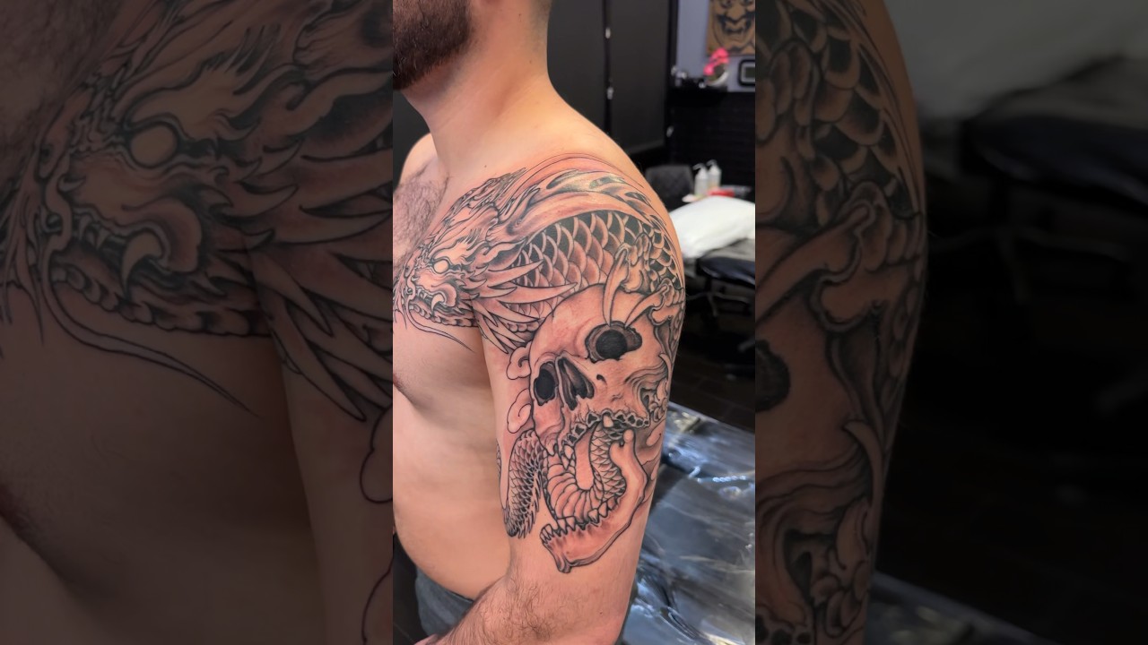 Half sleeve Dragon and skull tattoo finished 