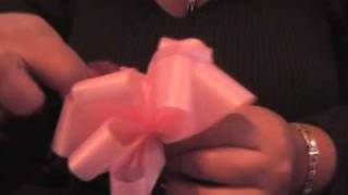 how to make a beautiful ribbon gift bow.