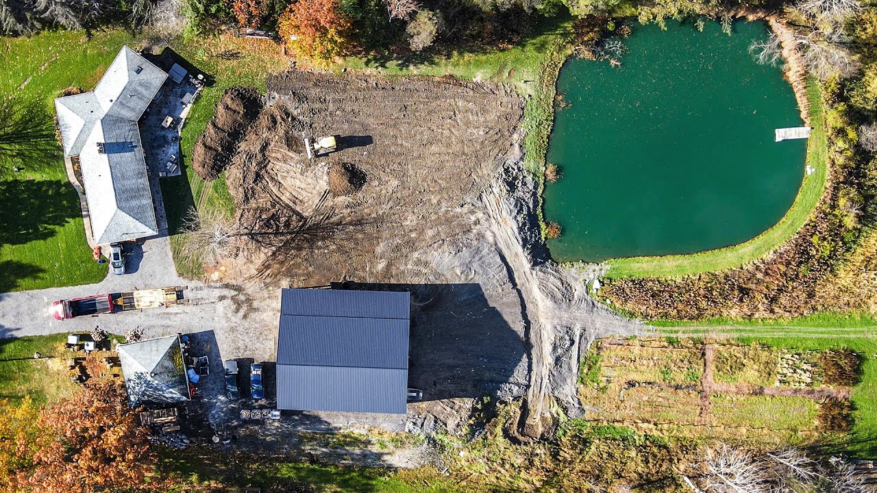Komatsu 37px and Ford Triple Nickle Backhoe excavating my backyard