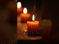 Cozy row of small candles burning slowly on a wooden table 🕯️
