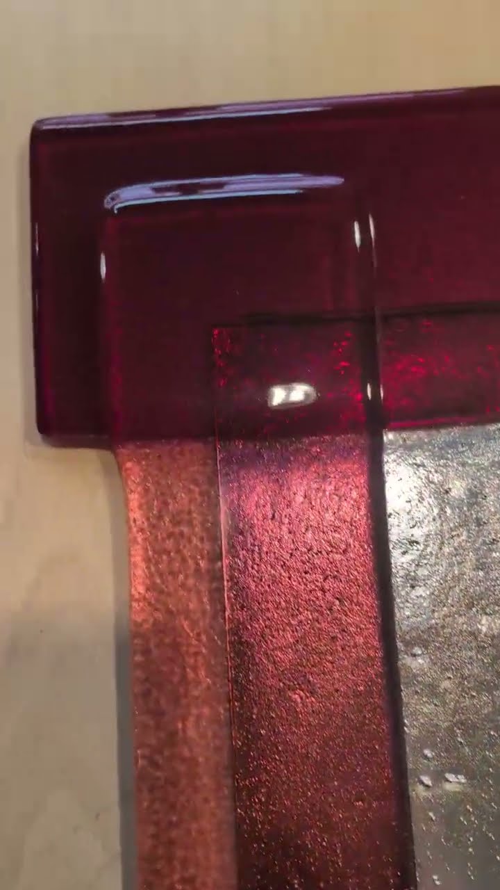 Glaskunst: rood glas met zilver