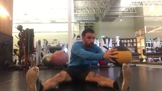 Wide leg toe-touch sit-ups