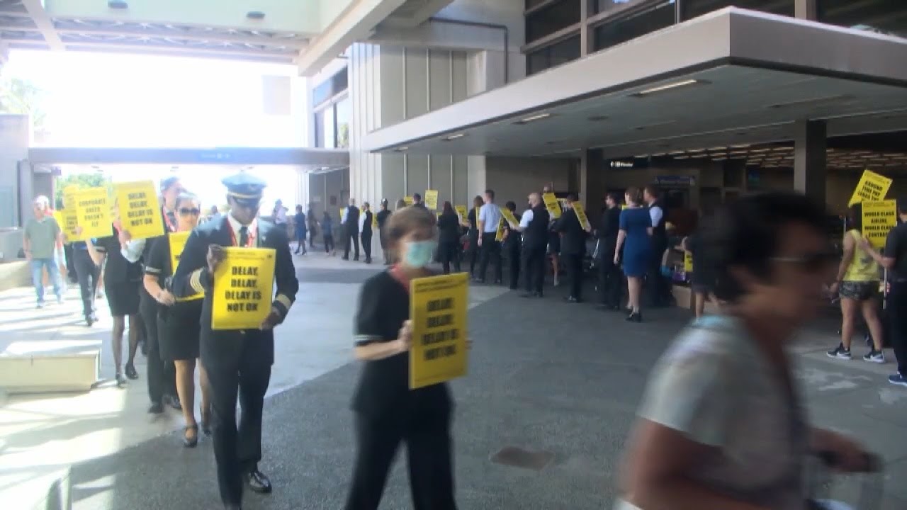 Flight attendants rally for fair contract at Honolulu airport amid ...