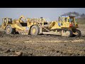 Cat D9's and Scrapers