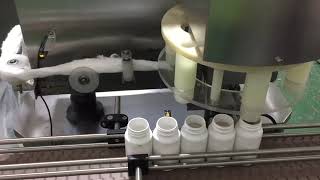 Single head cotton inserting machine