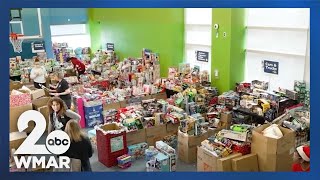 Parents pick out toys for the holidays at Johns Hopkins Children Center