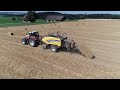 Strohpressen mit Steyr und New Holland Quaderballenpresse