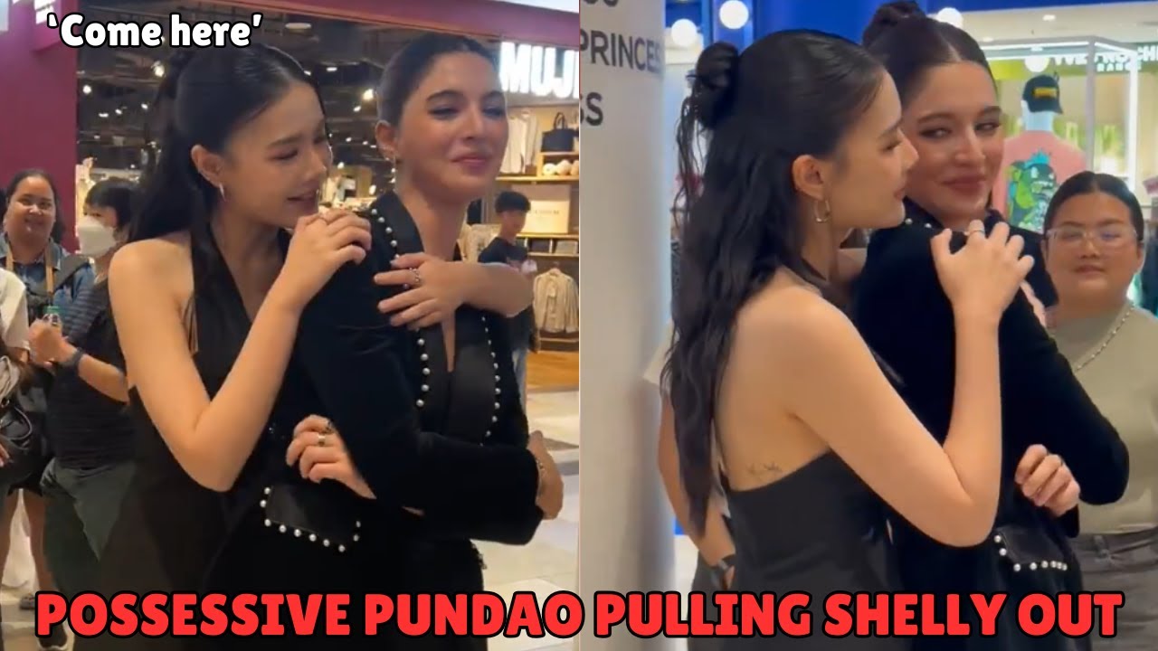 Possessive Pundao pulling Shelly out of the crowd
