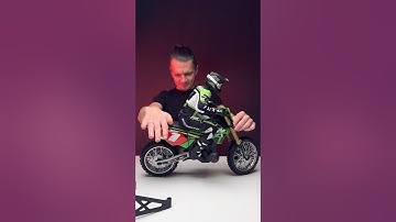 Losi Promoto 1/4 RC dirt bike with battery & charger. Realistic, stable, & powerful. Test drive soon