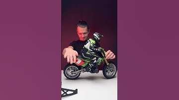 Losi Promoto 1/4 RC dirt bike with battery & charger. Realistic, stable, & powerful. Test drive soon