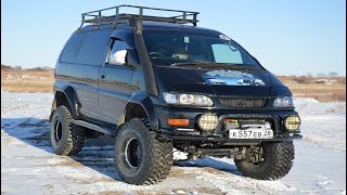 пробую установить резину 35 размера м т грязь mitsubishi delica