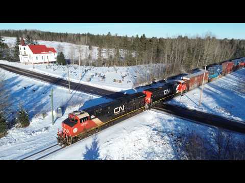 Awesome Aerial 4K View! Containers on Freight Train CN 594 West passing Boundary Creek, NB