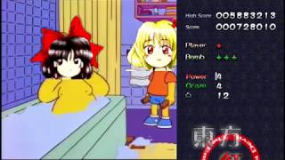 Rumia hits Reimu with a chair